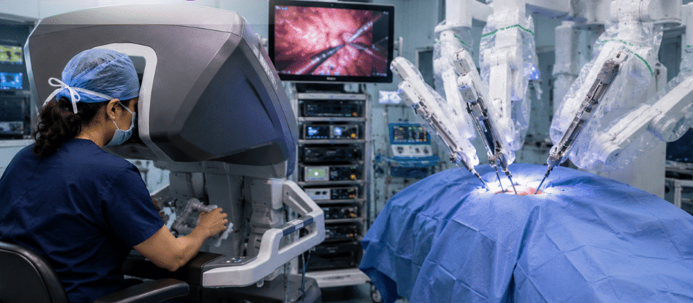 Female robotic surgical oncologist performing robotic-assisted cancer surgery using advanced robotic technology in a modern operation theatre